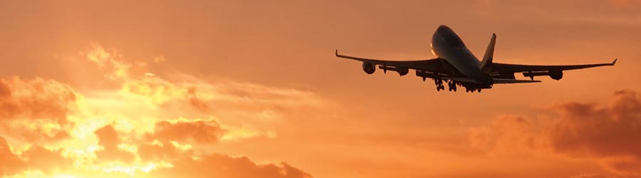 File Photo of Airplane in Flight with Sunset in Background, adapted from gps.gov image