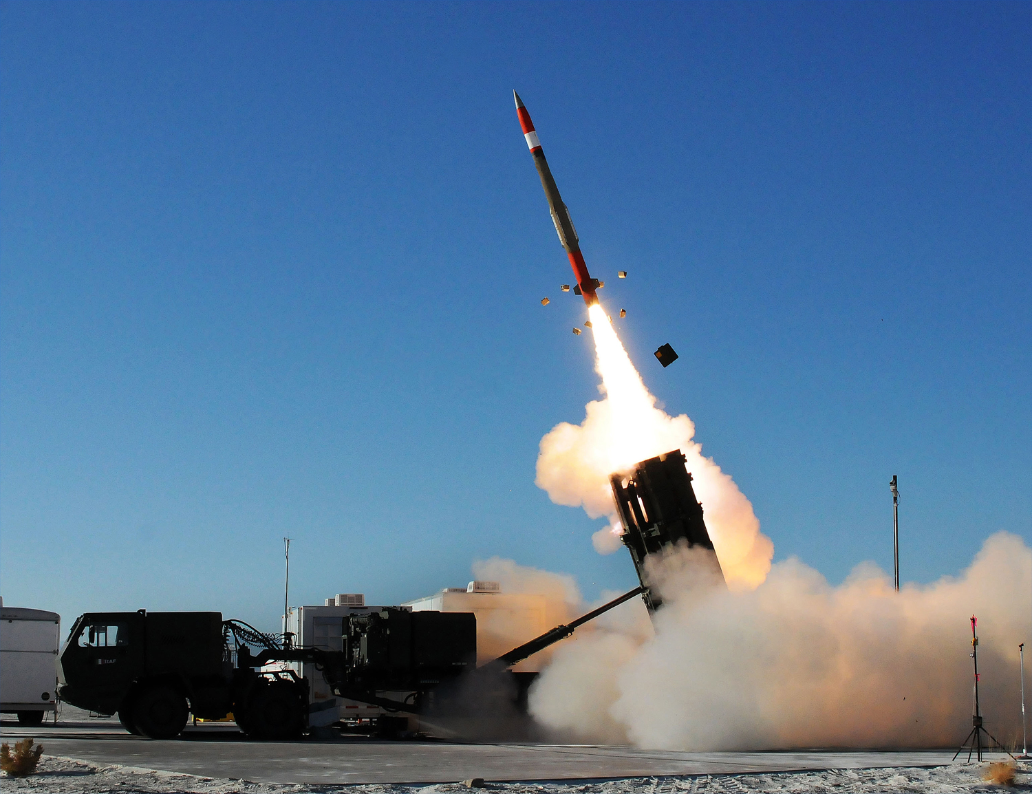 Patriot Missile Being Fired From Launcher, adapted from .gov image with photo credit to John Hamilton, U.S. Army